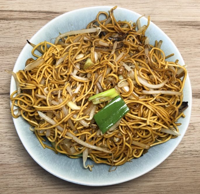 Chow Mein (with beansprouts) Chinese takeaway style Chow Mein with beansprouts on a serving plate.