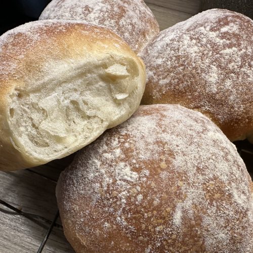 Scottish morning rolls on a cooling rack