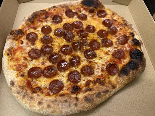 A pepperoni and hot honey pizza