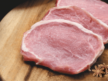 Slow cooked pork steaks with star anise ready to be slow cooked.