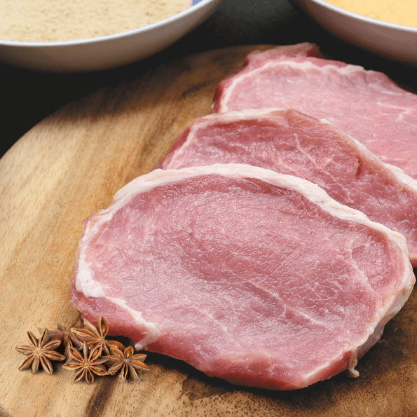 Pork shoulder with star anise ready to be slow cooked.