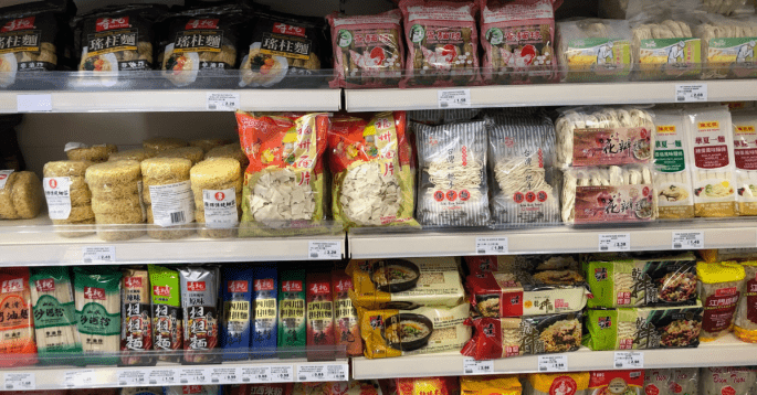 Chinese Takeaway Style Cooking Essentials Chinese takeaway style cooking ingredients on a Chinese supermarket shelf.