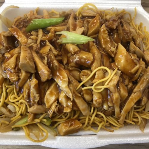 Chicken Chow Mein With Oyster Sauce in a takeaway style serving tray.