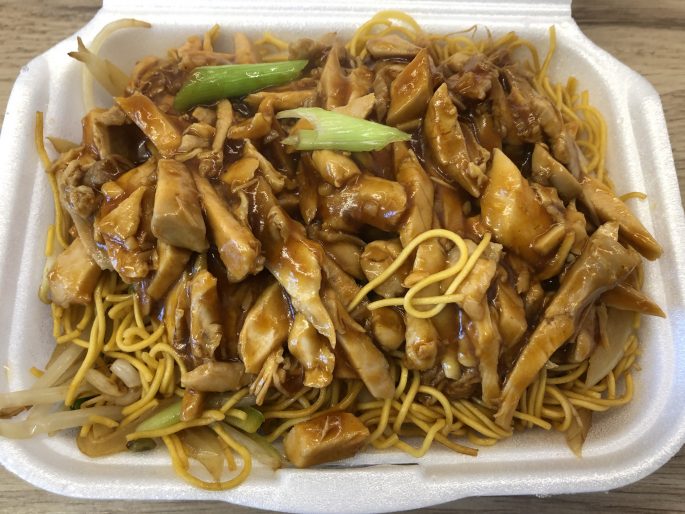 Chicken Chow Mein With Oyster Sauce in a takeaway style serving tray.