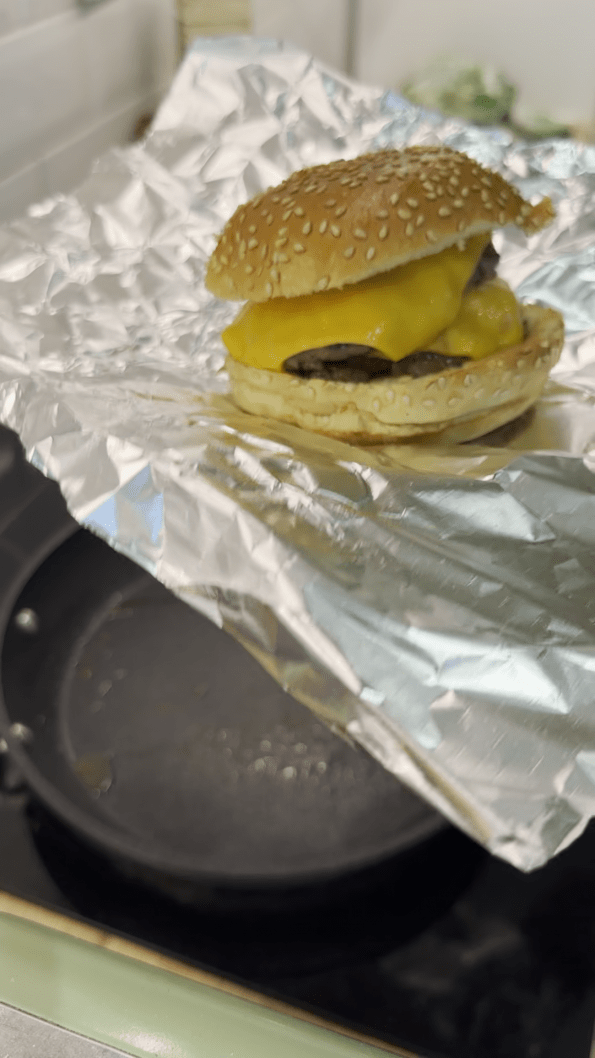 Double Smashed Burger in foil ready to serve.